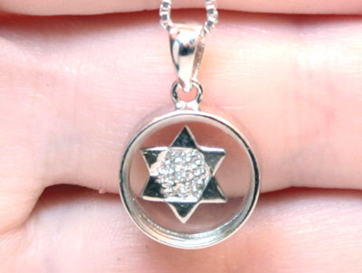 Sterling Silver Magen David Rotating on Glass in Ring Pendant
